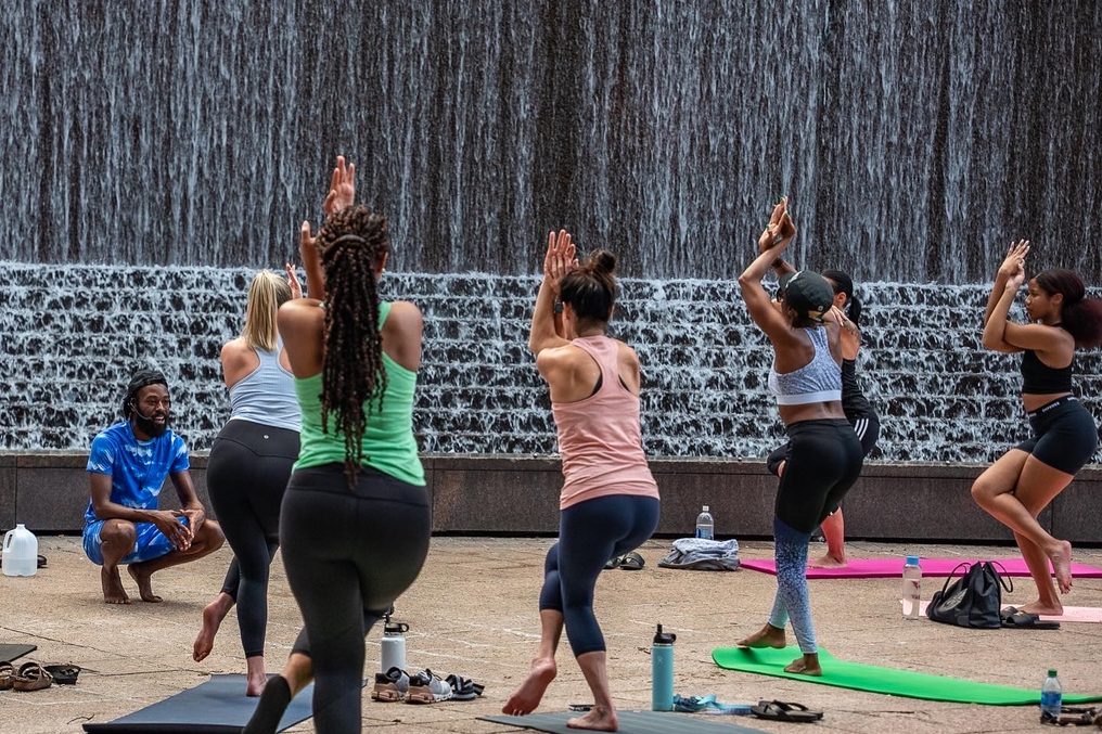 A class gathered at the waterfall wall.