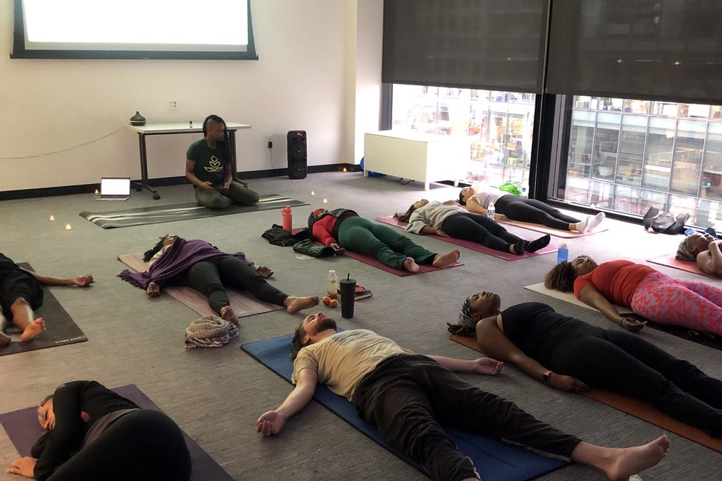 Bodies at rest across a studio floor.