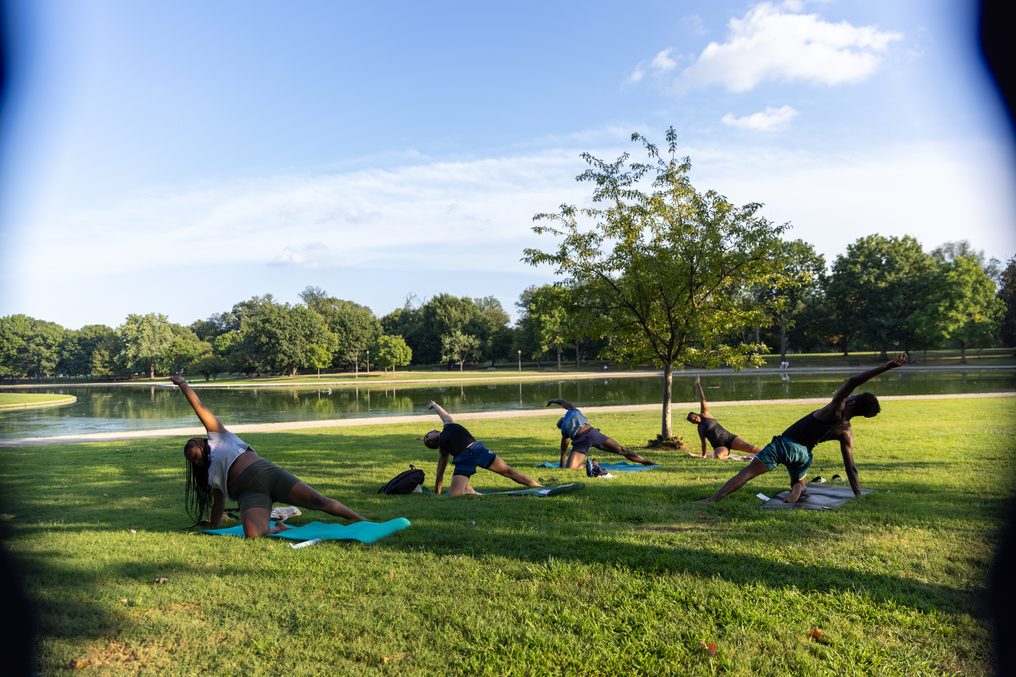 A lakeside class mid-flow on open ground.